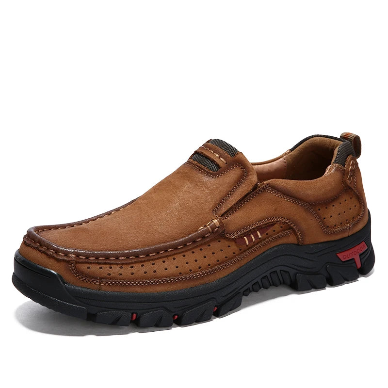 Brown leather shoe with black sole on a white background