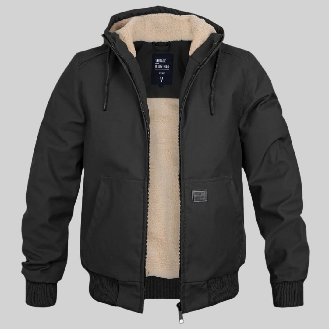 Black jacket with beige interior on a gray background