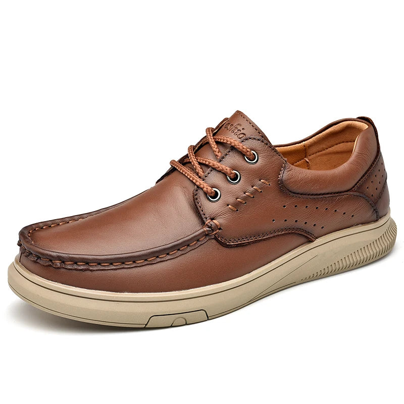 Brown leather shoe with beige sole on a white background