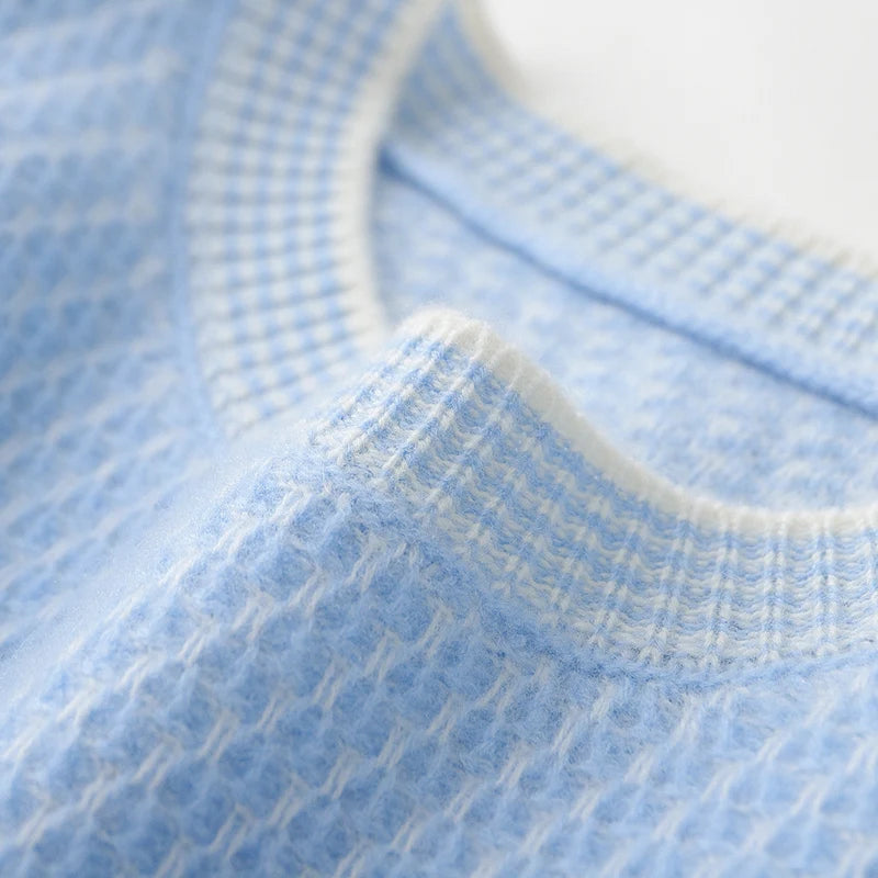 Close-up of blue textured fabric with a white border