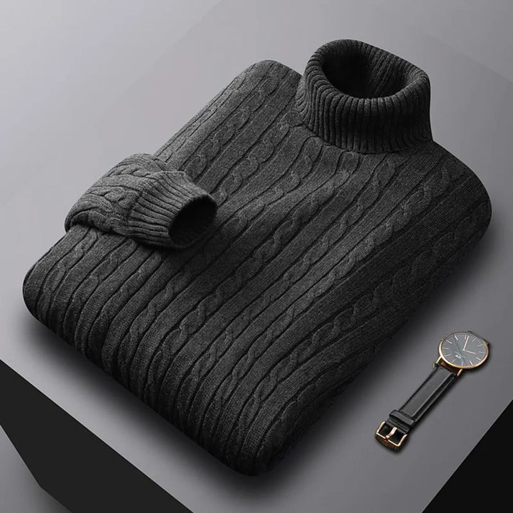 Dark gray ribbed sweater with a matching watch on a gray background
