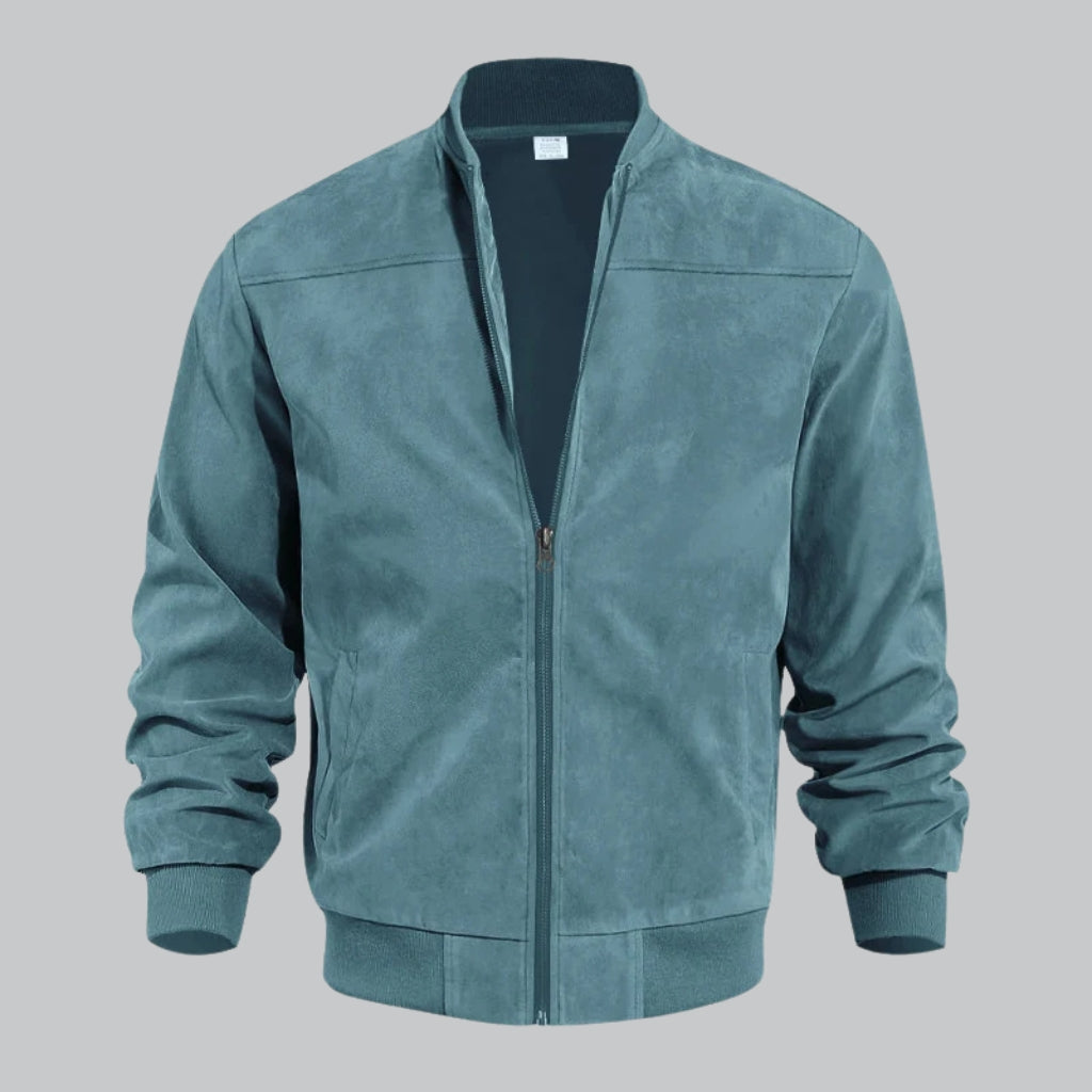 Teal jacket on a gray background
