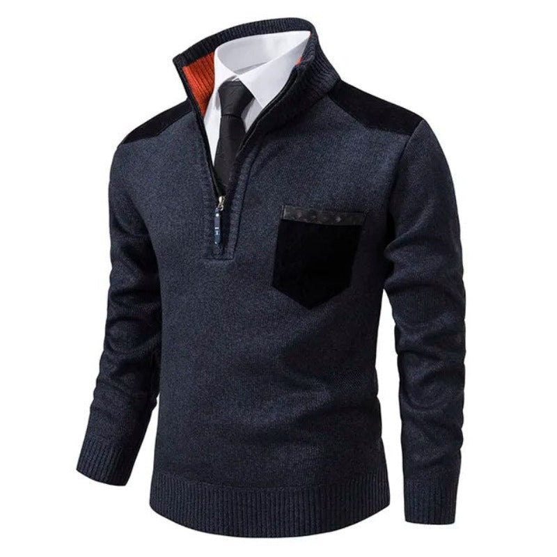 Dark gray sweater with a quarter zip and pocket on a white background