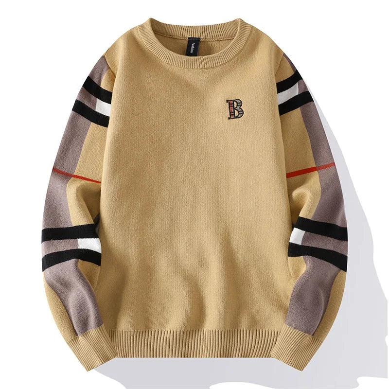 Beige sweater with striped sleeves on a white background