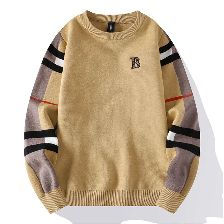 Beige sweater with striped sleeves on a white background