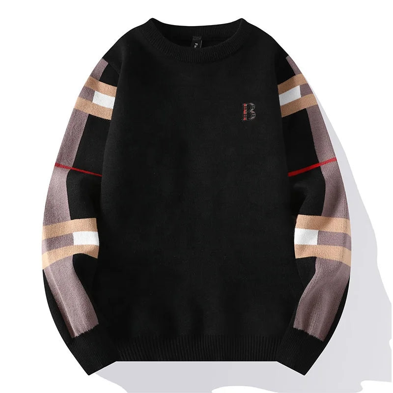 Black sweater with plaid sleeves on a white background