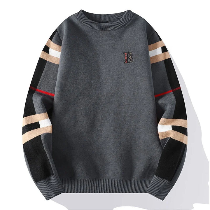 Gray sweater with striped sleeves on a white background