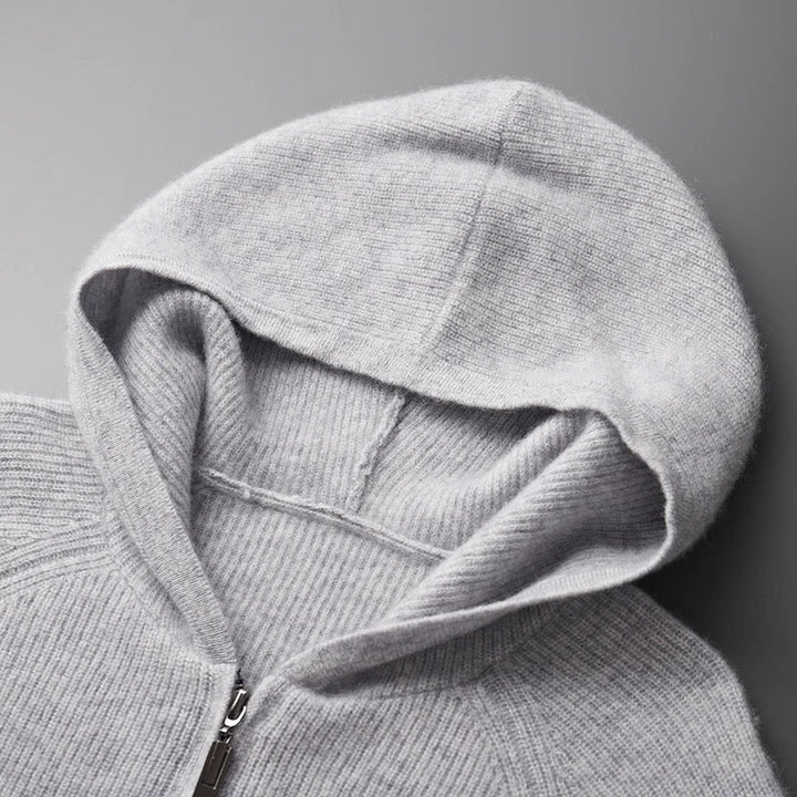 Gray hoodie with a hood on a gray background