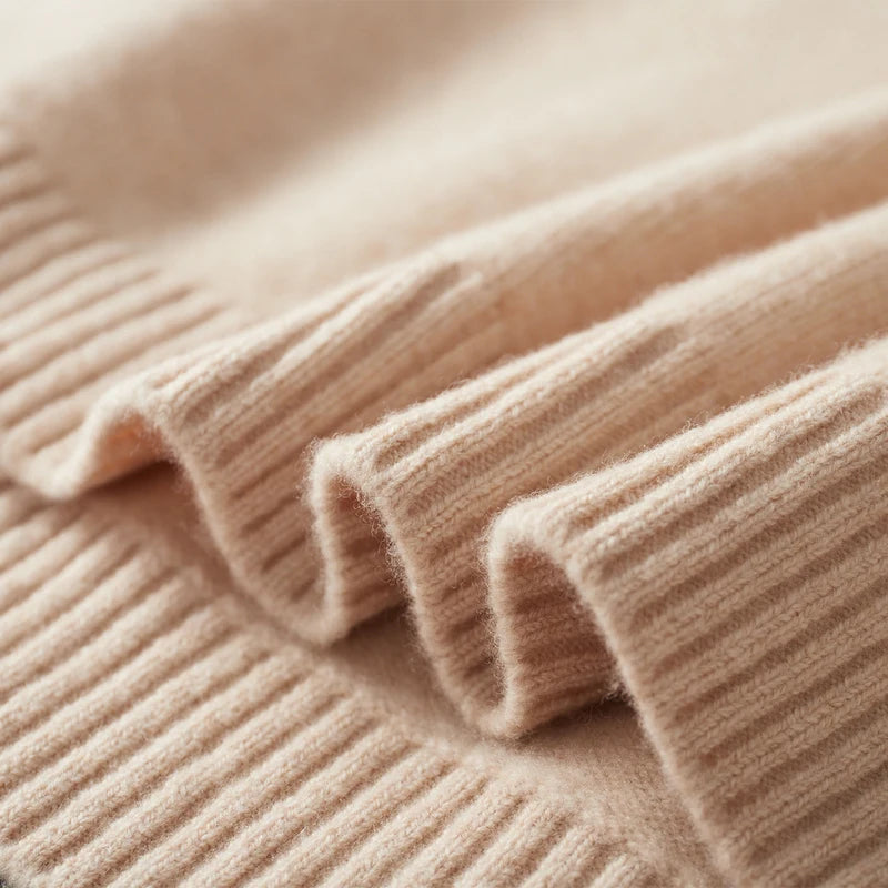 Close-up of a beige ribbed sweater fabric