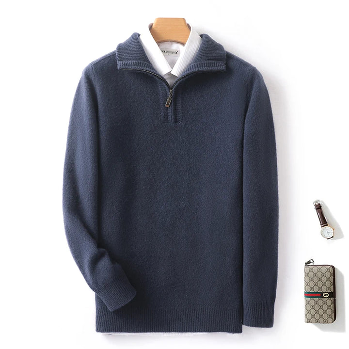 Navy blue sweater with a white collar on a wooden hanger, with a Gucci wallet and keychain on a white background.