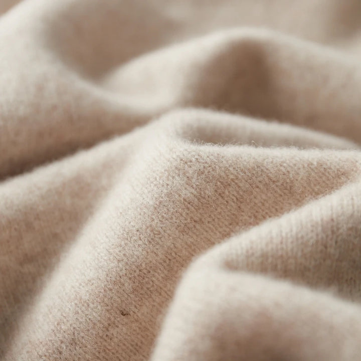 Close-up of beige fabric with soft texture