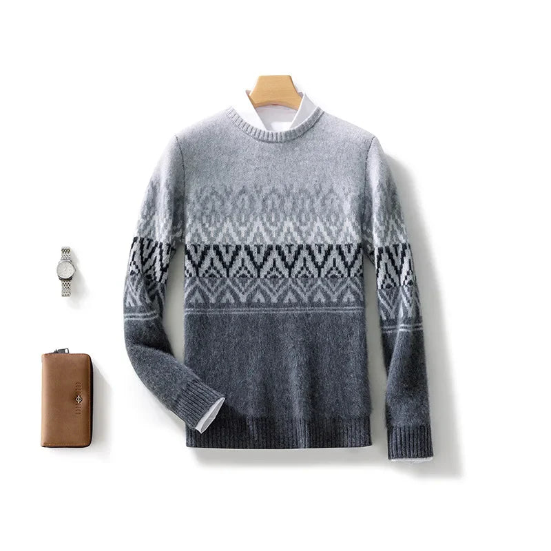 Gray sweater with a white pattern on a hanger, next to a watch and wallet on a white background