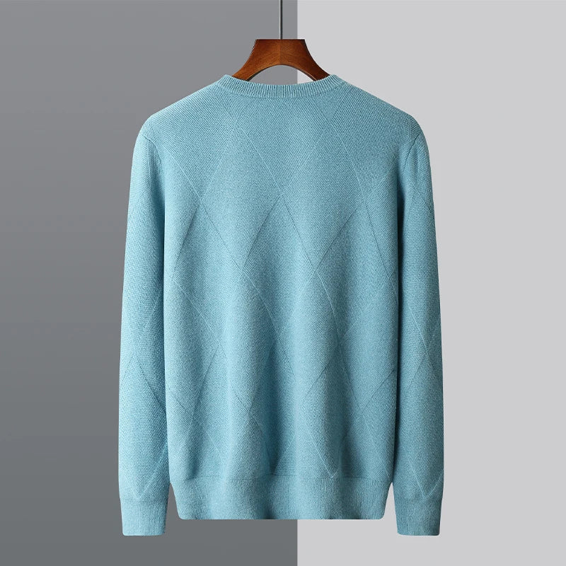 Light blue sweater on a hanger against a gray background