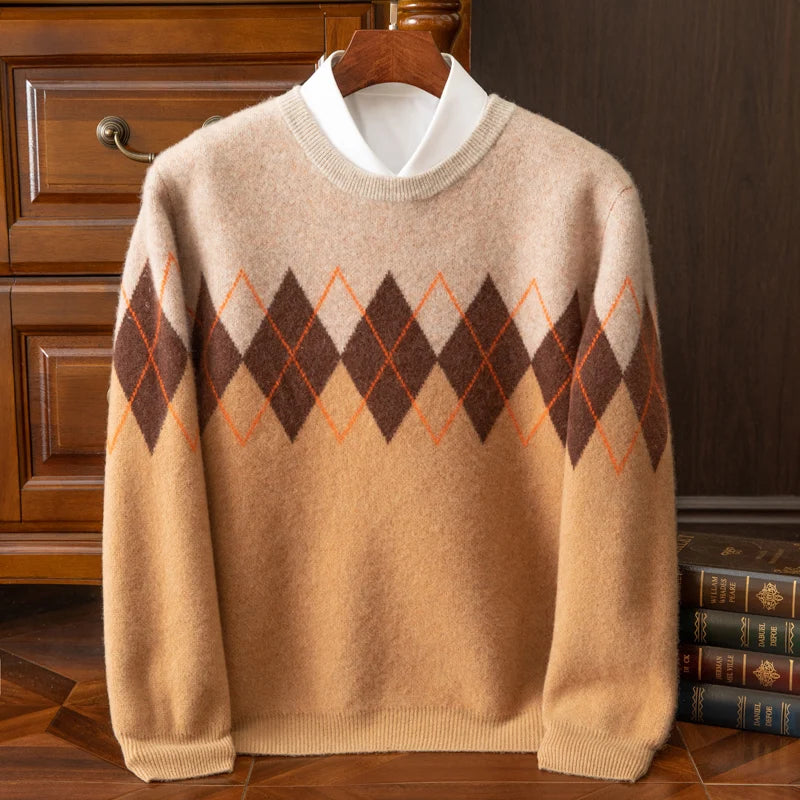 Beige sweater with diamond pattern on a wooden hanger against a wooden cabinet background