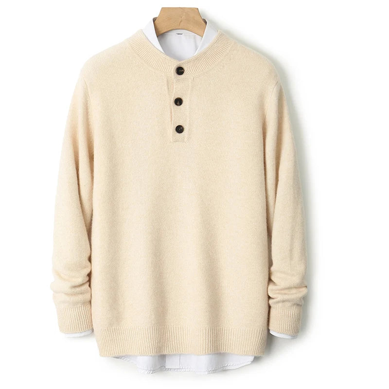 Beige sweater on a hanger against a white background