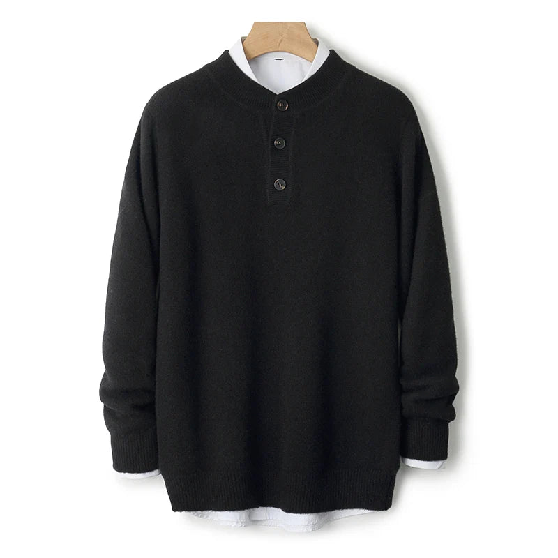 Black long-sleeve shirt with buttons on a wooden hanger against a white background