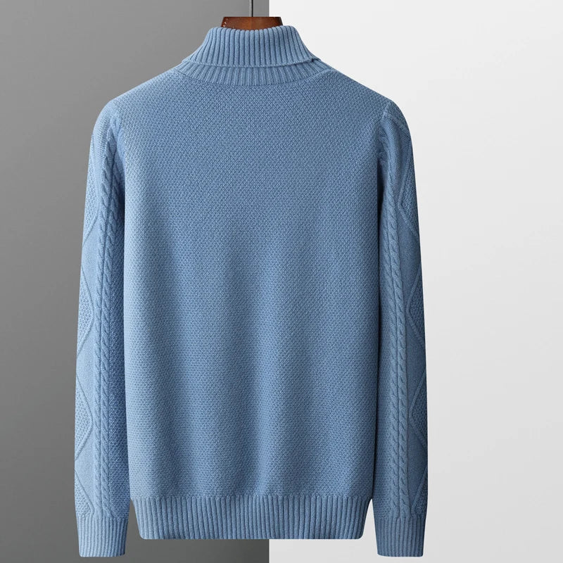 Light blue sweater on a gray background