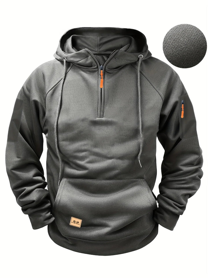 Gray hoodie with a quarter zip and orange accents on a white background