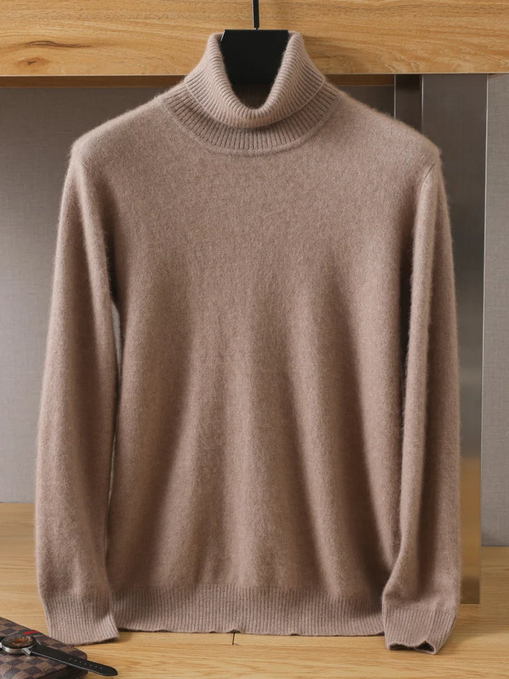 Beige turtleneck sweater on a hanger against a neutral background