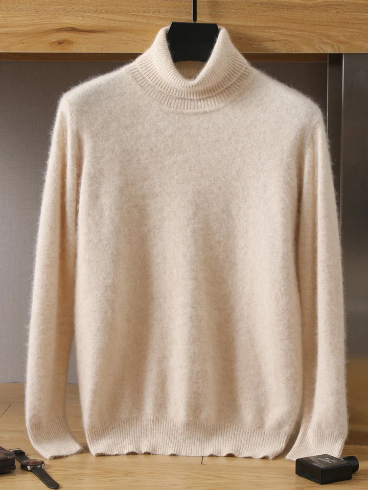 Beige turtleneck sweater on a hanger against a wooden background