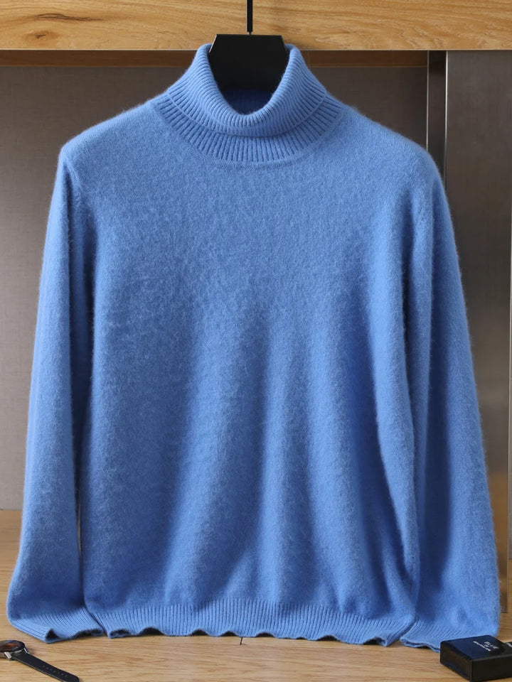 Blue turtleneck sweater on a hanger against a neutral background