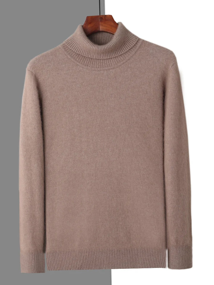 Beige turtleneck sweater on a hanger against a gray background