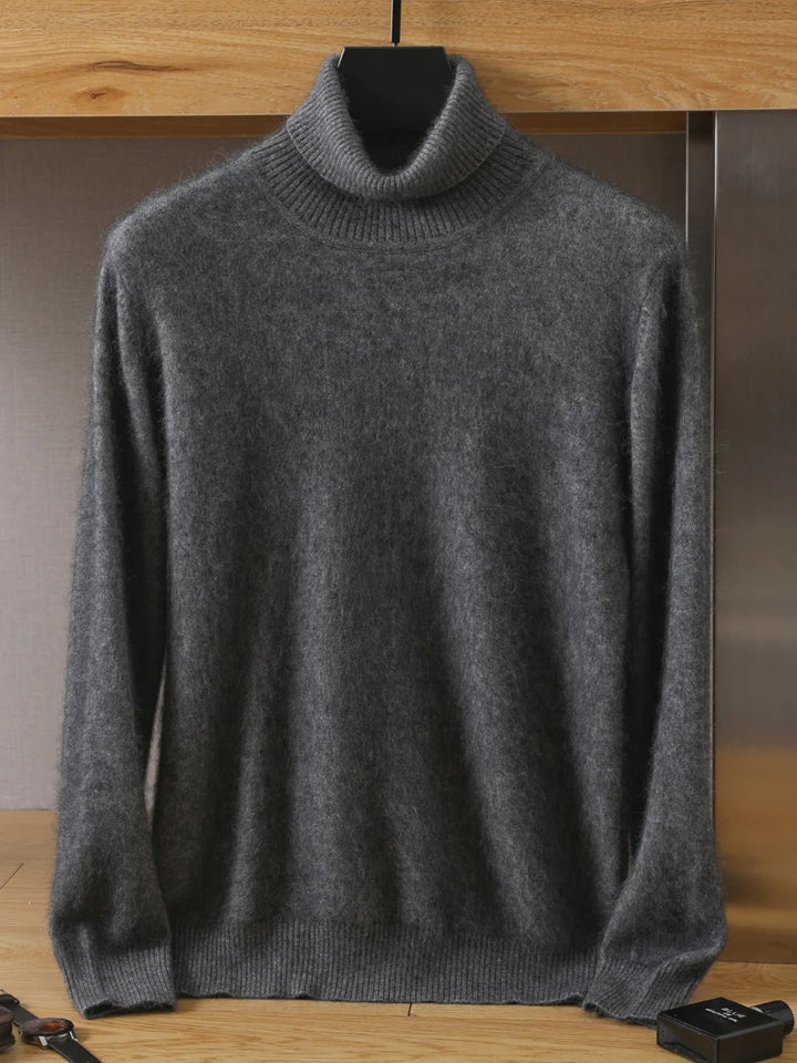 Gray turtleneck sweater on a mannequin against a neutral background