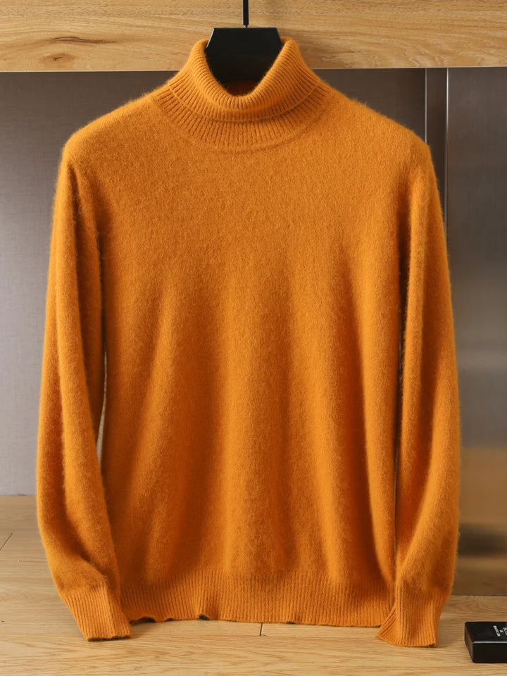 Orange turtleneck sweater on a hanger against a neutral background