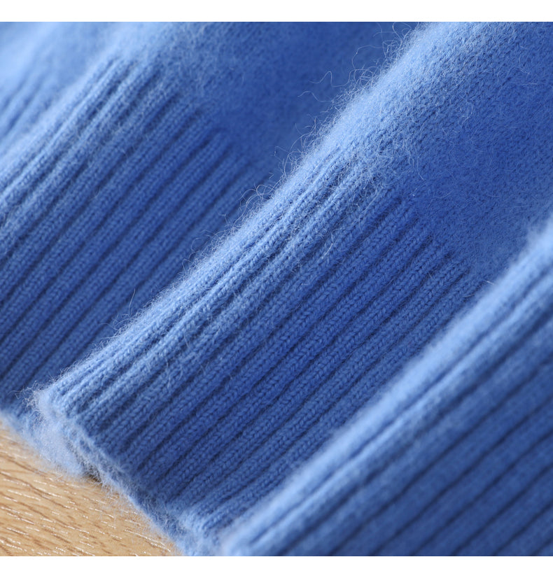 Close-up of blue yarn with a wooden surface underneath