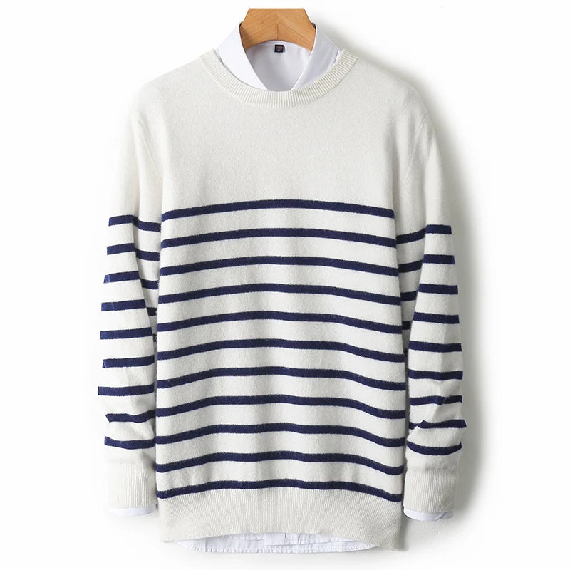 White sweater with blue stripes on a wooden hanger against a white background
