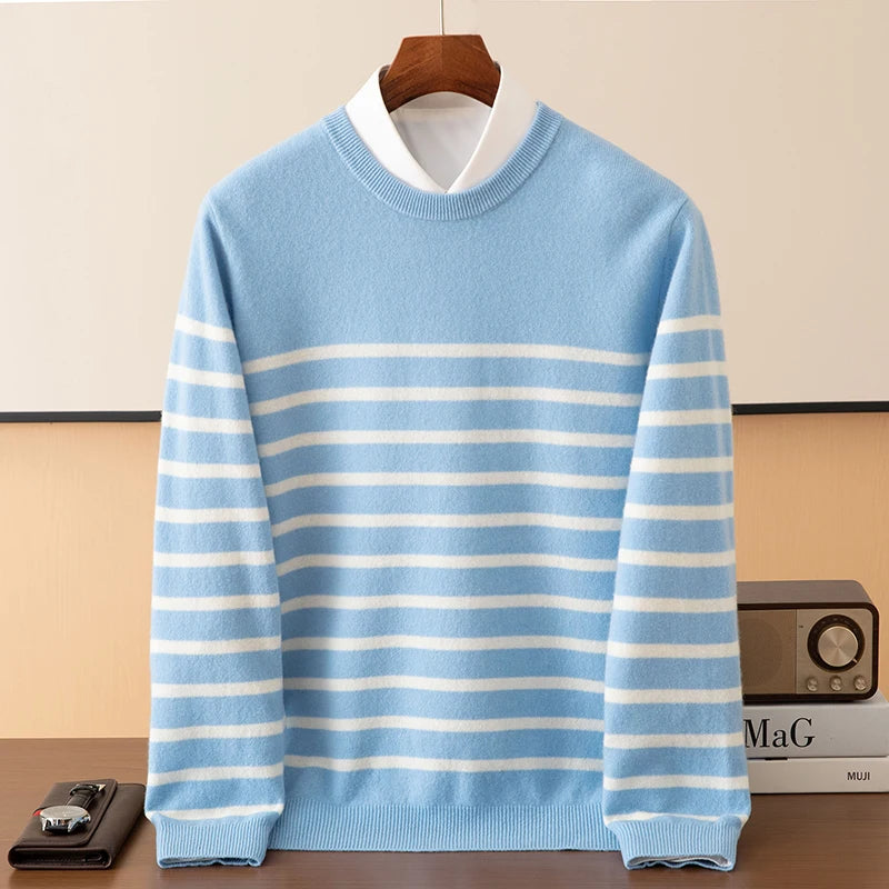 Blue and white striped sweater on a hanger against a beige background