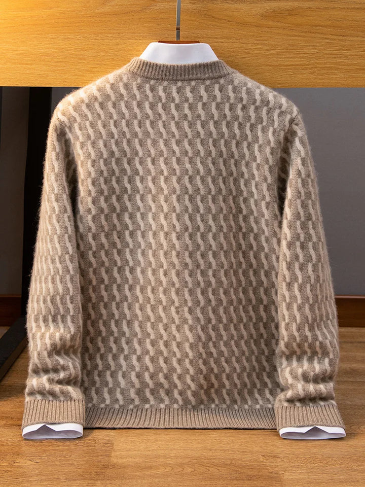 Beige patterned sweater on a mannequin against a wooden background