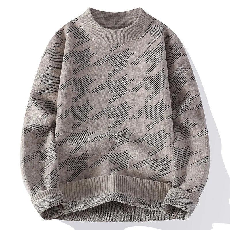 Gray sweater with a subtle pattern on a white background