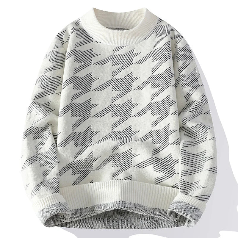 White sweater with black geometric pattern on a white background