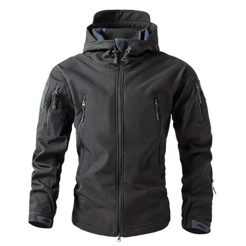 Black tactical jacket with multiple pockets and zippers on a white background