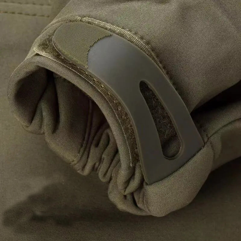 Close-up of a brown glove with a gray buckle on a matching background