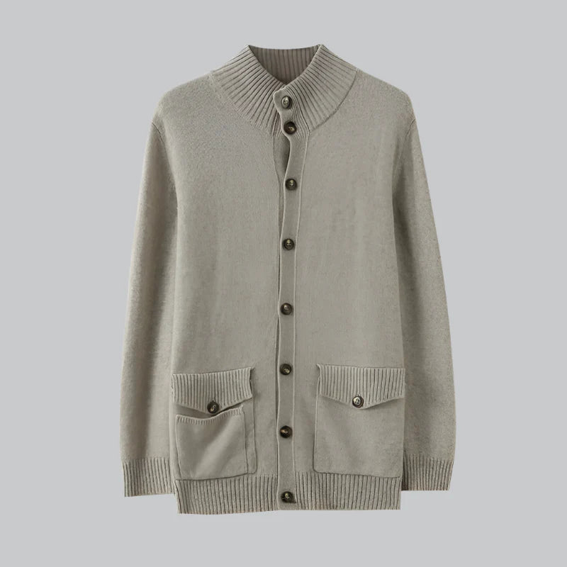 Light gray cardigan with button details on a light gray background