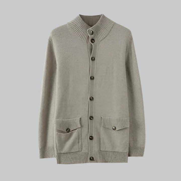 Light gray cardigan with button details on a light gray background