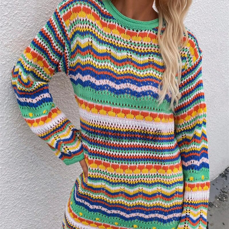Multicolored striped sweater worn by a person against a light background