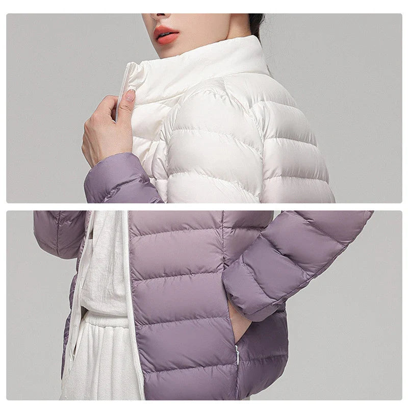 White and purple puffer jacket with a gray background