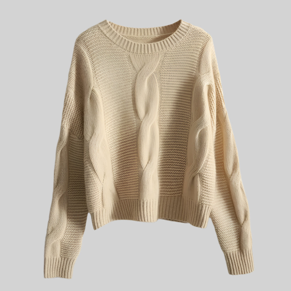Beige knitted sweater on a light gray background
