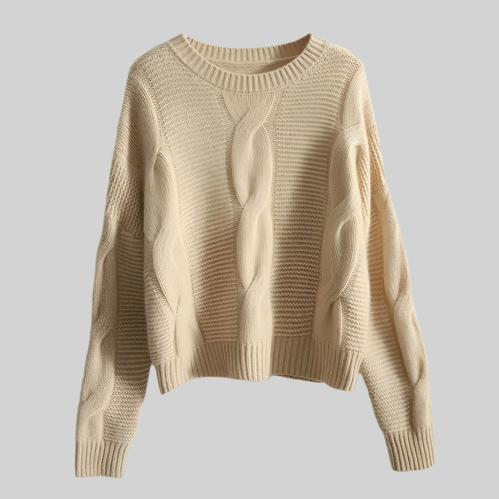 Beige knitted sweater on a light gray background