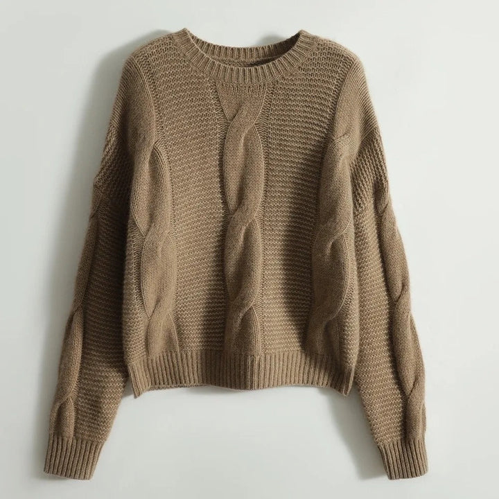 Brown knitted sweater on a light gray background